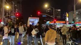 #dodgers fans opening the back of a passing semi-truck.