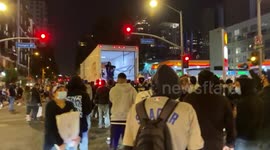 Newsflare Edit - #dodgers fans opening the back of a passing semi-truck.