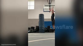 This stunning feat of strength and power shows an athlete performing a seemingly inhuman jump
