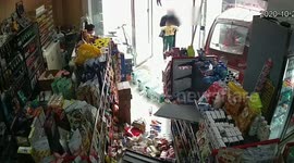 Three-wheeler accidentally started up by 3-year-old smashes into supermarket in China