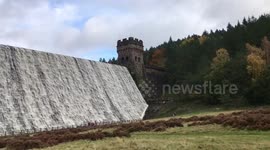 Overflowing Derwent reservoir Dam following heavy rain