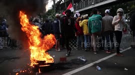 Workers and students protest against Indonesia's 'job creation' law