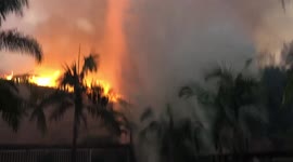Splash! Firefighting Chinook dumps water on Blue Ridge area homeowner
