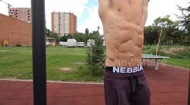 Shredded guy workout his six pack outdoor