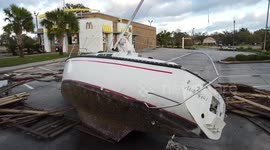 Hurricane Zeta floods carry boat into McDonald's parking lot