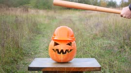 Already sick of Halloween? Pumpkin in hard hat vs baseball bat