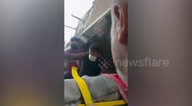 Survivor pulled from collapsed building after earthquake shakes Izmir, Turkey