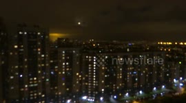 Nearly full waxing Moon appear above St Petersburg, Russia