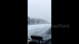 Snow conditions lead to truck overturning on Connecticut's Interstate 84 highway
