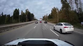 Crazy driver weaving between lanes almost causes accident