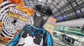 Filipino man goes shopping in Spiderman Black Symbiote suit for Halloween