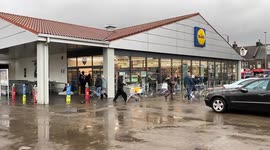 Lines form at UK supermarket as England lockdown expected next week