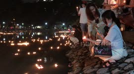 Buddhist devotees take part in stunning festival in Bangkok