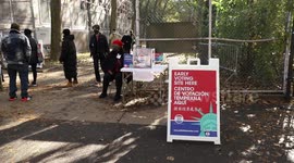 Long lines form outside early voting location in Manhattan