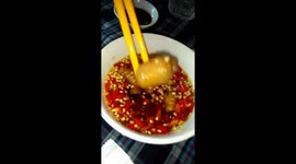 Would you eat live coconut worm? This Vietnamese specialty crawls around your plate