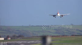 Planes negotiate 40mph winds at Bristol Airport during Storm Aiden
