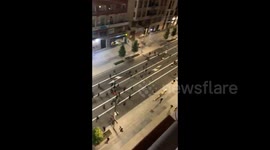 Anti-lockdown protesters block main road in central Madrid and light fires