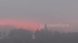Fog and sunset created apocalyptic scenery over St Petersburg, Russia