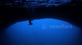 Walking upside down inside a cave