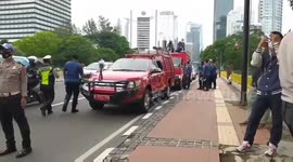 Police Evacuate People Climbing Highway Signposts. Jakarta, Indonesia