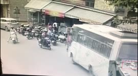 Narrow escape for pedestrians as out of control bus rams into hotel in India