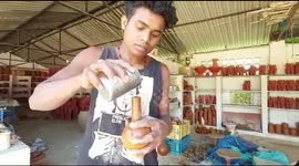 Indian potter creates dozens of long-lasting lamps that stay alight for over 40 hours