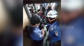 Teenager rescued after falling into 90ft deep well in Indonesia