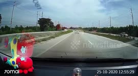Shocking moment pickup truck swerves over central reservation crashing into oncoming car