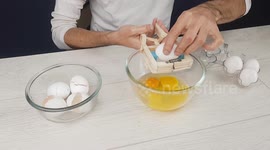 YouTuber creates device to crack open eggs from popsicle sticks