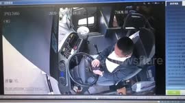 Bus carrying passengers rear-ends truck on Chinese highway as driver plays on phone while driving