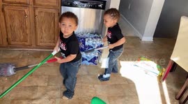 Kids attempt to clean up their mess after being caught red-handed