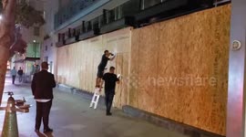 Stored board up windows in Santa Monica amid fears of post-election violence