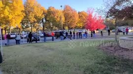 US voters in long lines to vote on historic election day