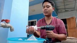 Thai dad has awesome power drill hack for cleaning baby bottles