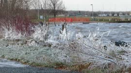 The power of Lake Superior waves cool icicles on the shores of Ashland WI