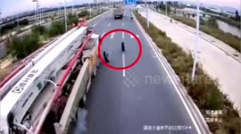 Runaway tyre knocks over scooter rider after falling off truck on Chinese road