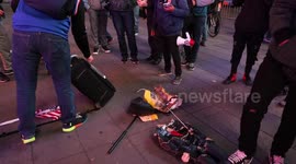 Donald Trump effigy destroyed by demonstrators in New York City's Times Square