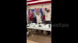 Relief and a wave as poll workers celebrate polling station close