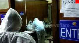 Covid 19 patients physically vote in polling booth wearing PPE Kit in Indian election