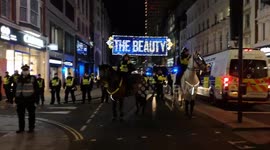 Oxford Street Christmas Lights Look Ironic Next to Police