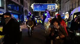 Violence and arrests at anti-lockdown Million Mask protest in London