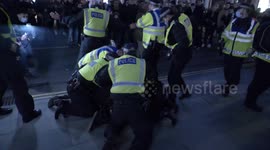 'Santa Claus' questioned as London anti-lockdown protest leads to scuffles and 104 arrests