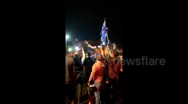 Conspiracy theorist Alex Jones shows up at Arizona Trump rally as re-election bid seems faltering