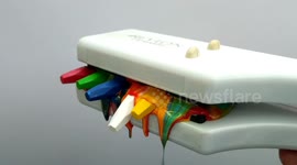 Watch the colours melt as YouTuber uses hair straightener and heat gun on wax crayons