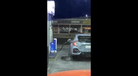 Car Spilling Gas At A Gas Station In Los Angeles