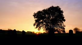 Beautiful sunset over The Grey Ladies, Nine Stone Close Stone Circle, Robin Hood's Stride, Peak District National Park, Derbyshire, UK