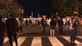 People gather at the White House to listen to Biden's speech urging unity