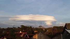 Rare UFO clouds form over mountains in Indonesia