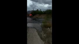 After the devastating Bighorn Fire in Tucson, Arizona, the first rain of the season produces water blackened by debris.