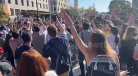 Champagne for the campaign! Throng of Biden supporters in DC celebrate presidential elect by spraying bubbly